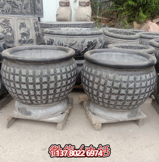 自然美學(xué)結(jié)合青石石雕、浮雕、編織、雕塑的戶外園林魚(yú)缸